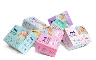 Collection of baby product boxes on a white background