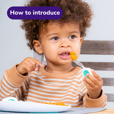 Child eating with a doddl spoon and fork, with text 'How to introduce' at the top.
