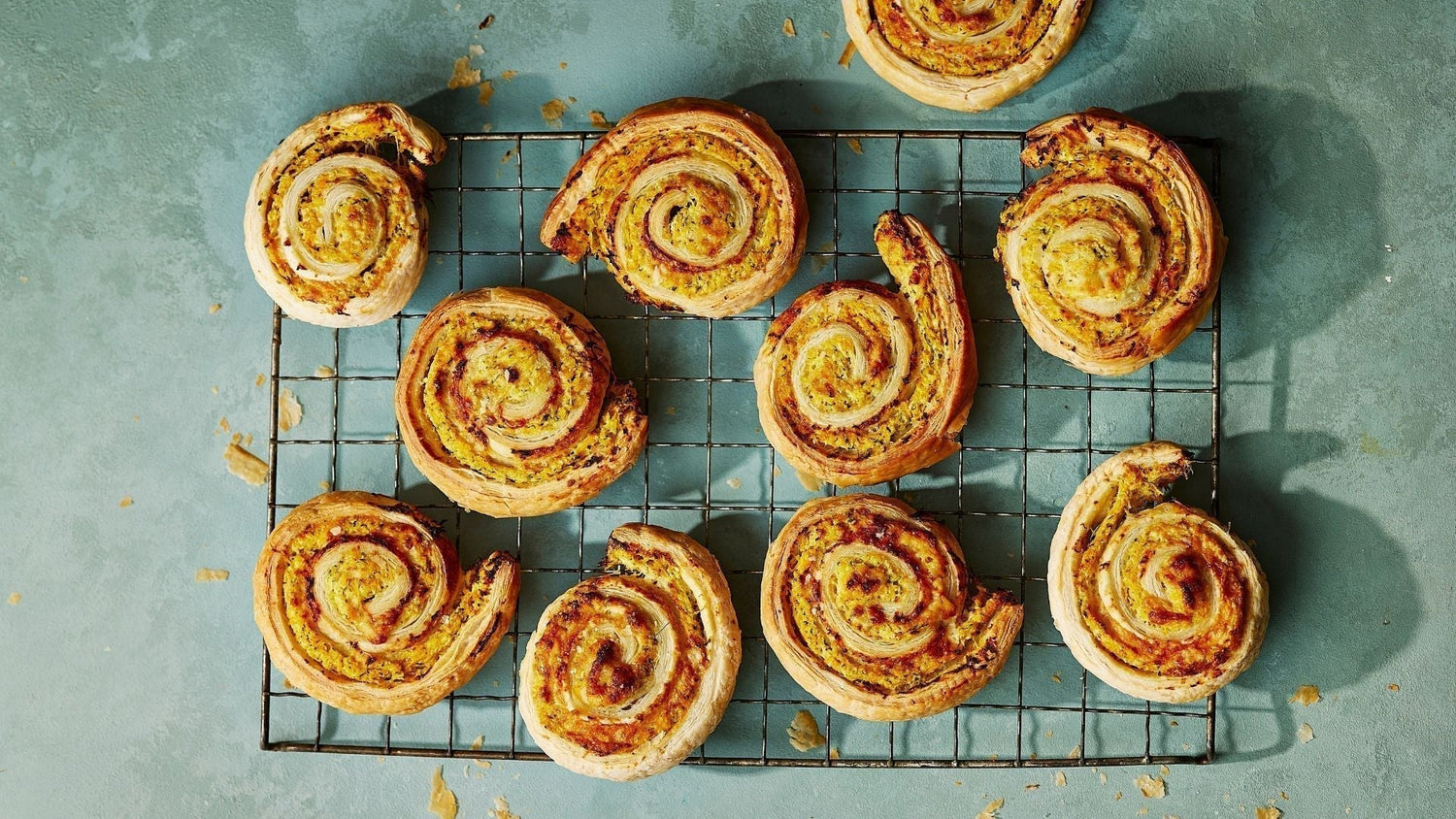 Veggie Puff Pastry Pinwheels on a cooling rack