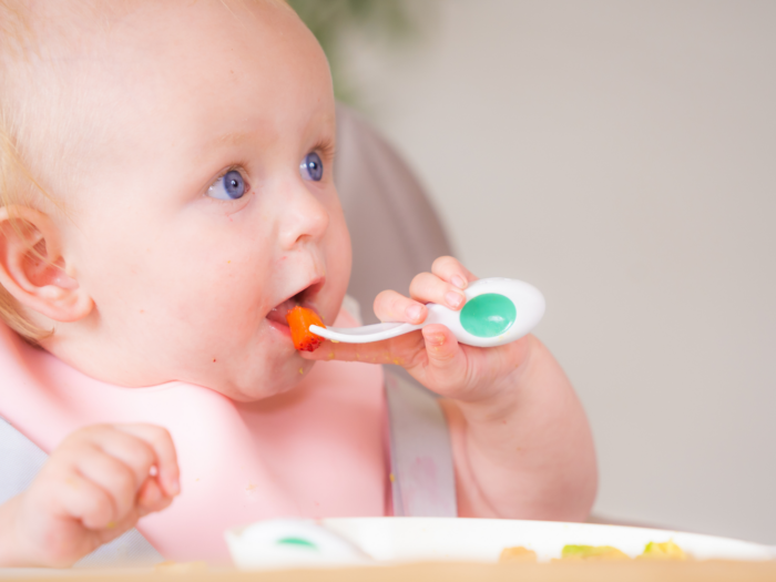 Utensil Use Milestones - baby using doddl utensils|doddl baby utensil set|doddl baby utensil set