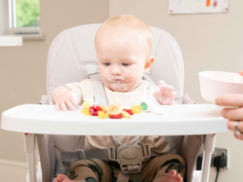 Weaning Myths|Weaning Myths – Fact Versus Fiction|Lucy Upton - Children's Dietitian - bio image|Baby in highchair