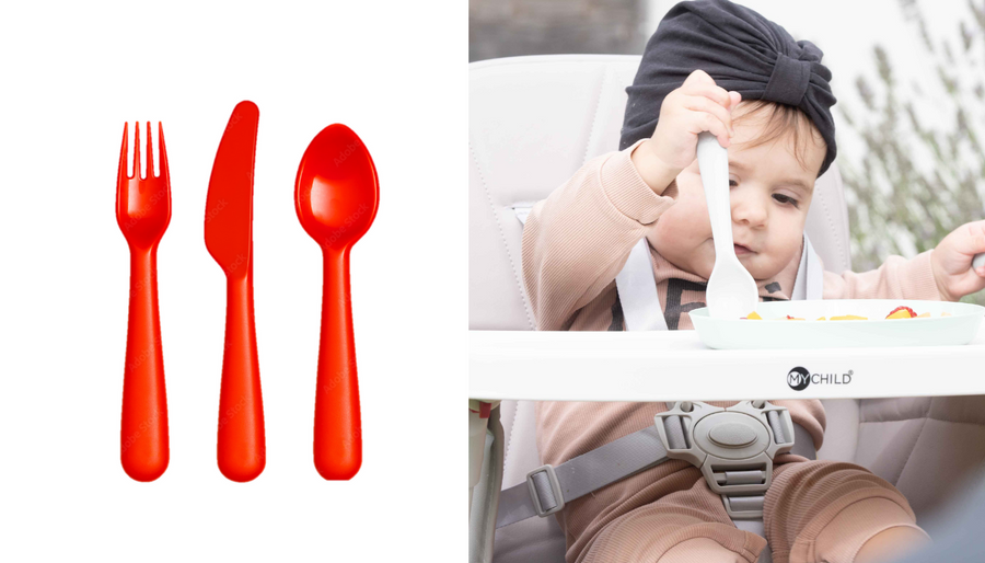 Standard plastic children's cutlery next to a baby struggling to hold it